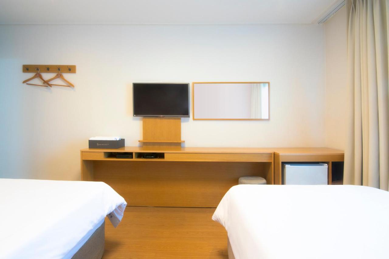 Sims Hotel Jeju Exterior foto